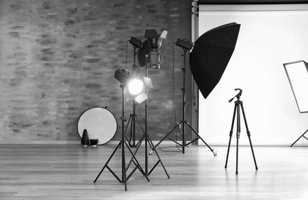 Empty photo studio with lighting equipmentの写真素材