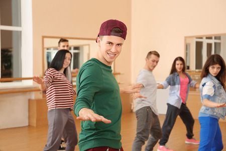 Group of young hip-hop dancers in studio
