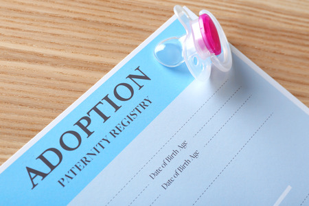 Adoption paternity registry with pacifier, closeup