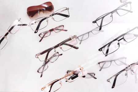 Shelf with different glasses in shopの写真素材