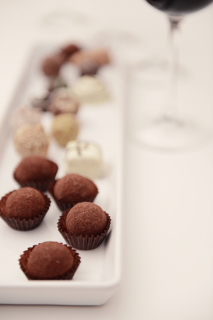 Delicious chocolates on white table closeupの写真素材