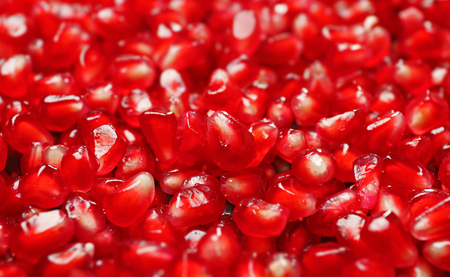 Fresh juicy pomegranate seeds as background, closeupの写真素材