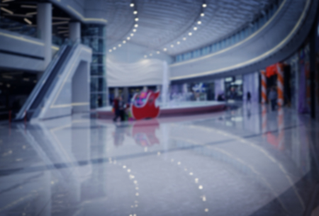 Blurred background of big shopping mallの写真素材