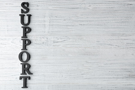Word SUPPORT on wooden backgroundの写真素材