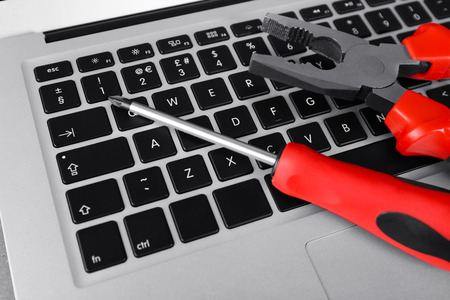 Instruments on laptop keyboard, closeupの写真素材