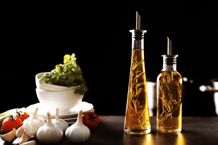 Bottles with oil on tableの写真素材