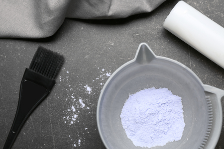 Professional kit for hair dyeing on dark backgroundの写真素材