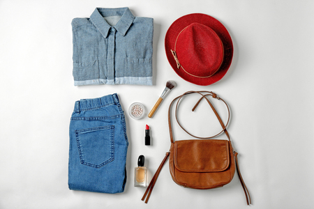 Set of stylish clothes and cosmetics for woman on white backgroundの写真素材