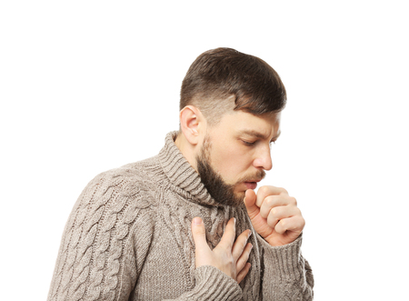 Young ill man on white backgroundの写真素材