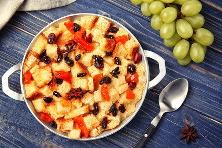 Delicious bread pudding with fruits on tableの写真素材