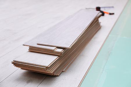 Wooden panels on new laminated flooringの写真素材