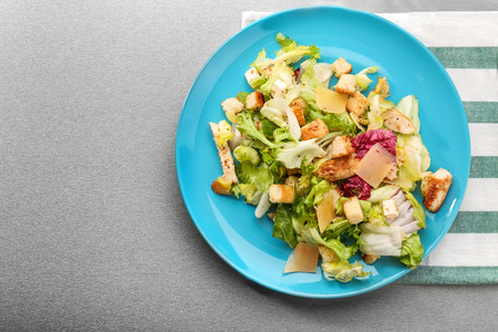 Plate with chicken salad on tableの写真素材