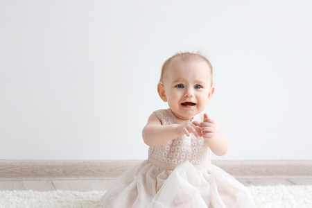 Cute funny baby at homeの写真素材