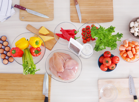 Fresh ingredients for cooking on table, top viewの写真素材
