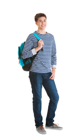 Teenager with backpack standing on white backgroundの写真素材