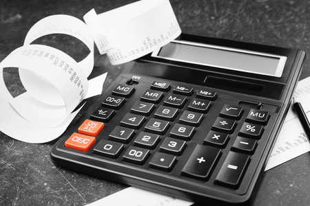 Calculator with adding machine tape, closeupの写真素材