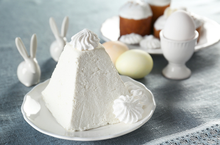 Traditional curd Easter cake on table