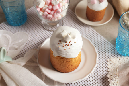 Easter cake in white plate on festive table