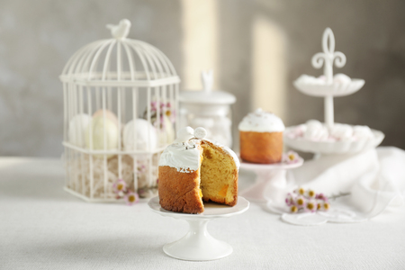 Easter cake with raisins on light blurred background