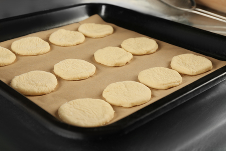 Raw dough for cookies on baking tray, closeupの写真素材