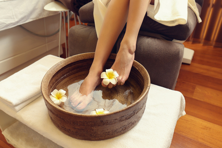 Female feet treatment in spa salonの写真素材