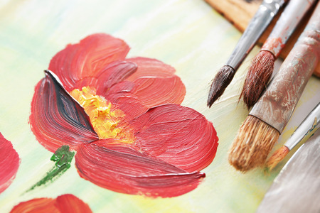 Beautiful oil painted picture with artist equipment, closeupの写真素材