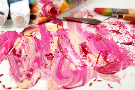 Artist supplies and accessories with paint on paperの写真素材