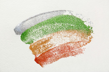 Colorful glitters on paper, closeupの写真素材
