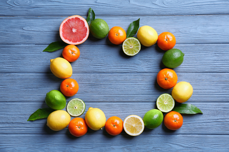 Beautiful composition of tropical fruits on wooden backgroundの写真素材