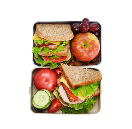 Lunch boxes with delicious food on white backgroundの写真素材
