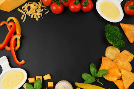 Still life with food ingredients on black backgroundの写真素材