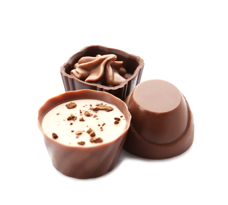 Delicious chocolate candies, isolated on whiteの写真素材