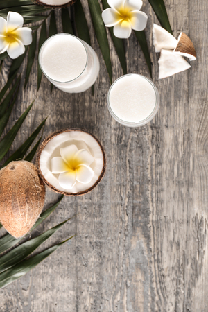 Beautiful composition with coconut water on tableの写真素材