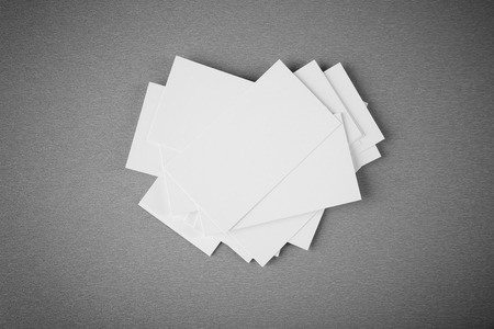 Blank paper cards for branding on grey backgroundの写真素材