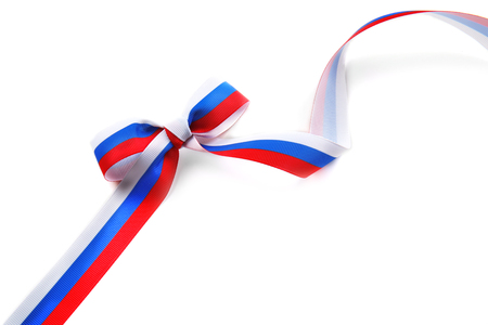 Ribbon bow in colors of Russian flag on white backgroundの写真素材