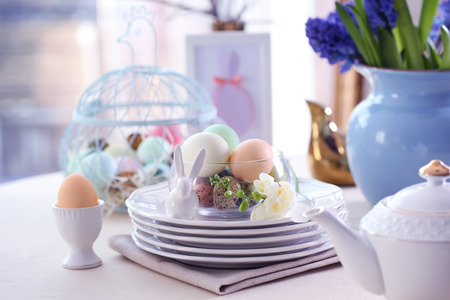 Beautiful Easter table setting  on linen tablecloth