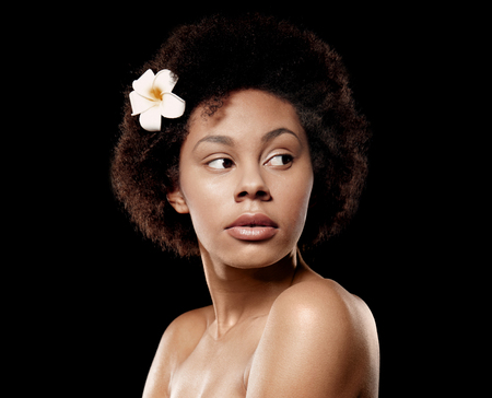 Beautiful African girl on black backgroundの写真素材