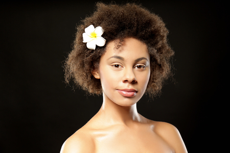 Beautiful African girl on black backgroundの写真素材