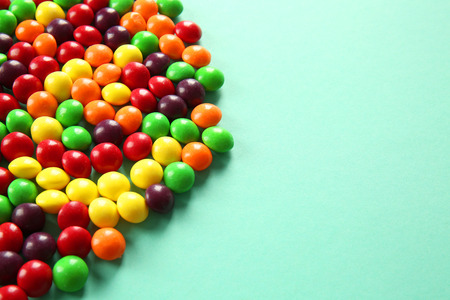 Colorful candies on color background, closeupの写真素材