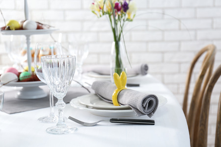 Beautiful Easter table setting in light room