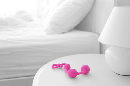 Anal balls lying on bedside tableの写真素材