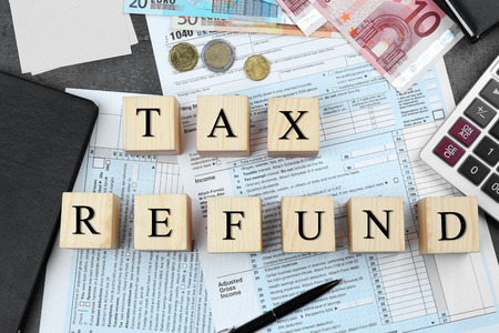 Cubes with space for text on table. Tax return conceptの写真素材