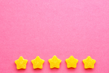 Tasty jelly candies on color backgroundの写真素材