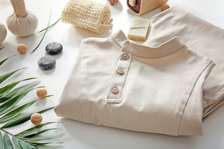 Composition with spa uniform on white backgroundの写真素材