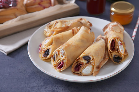 Plate with tasty dessert on tableの写真素材