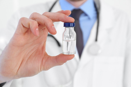 Doctor with medicine for vaccination, closeupの写真素材