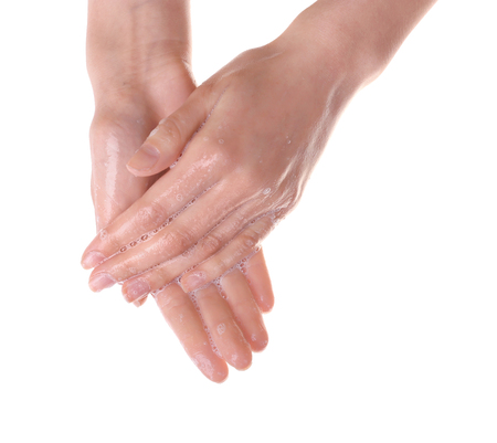 Washing hands on white backgroundの写真素材
