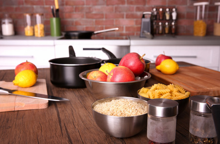 Kitchenware for cooking classes on wooden table