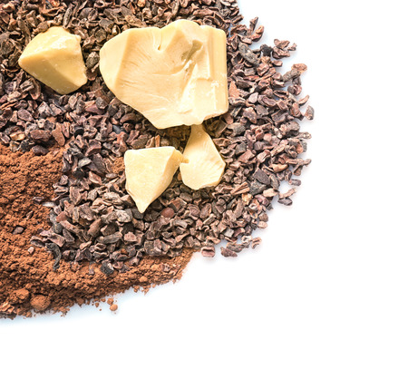 Cocoa nibs, butter and powder on white background