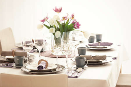 Table with beautiful setting in restaurantの写真素材